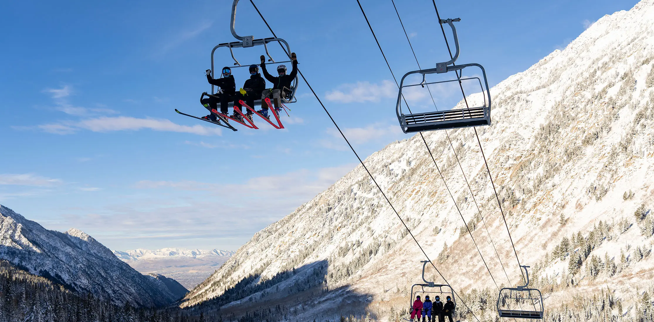 opening day - friends stoked on a chairlift