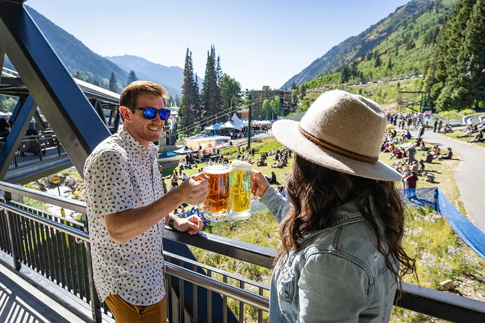 Oktoberfest at Snowbird- Drinking beers on chickadee hill