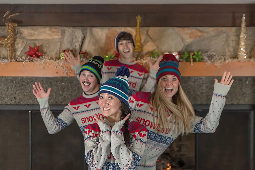 Group wearing Ugly Sweaters in preparation for the Holiday Sweater Party at the Tram Club