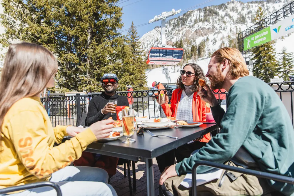 Group enjoying apres at Snowbird's Forklift restaurant