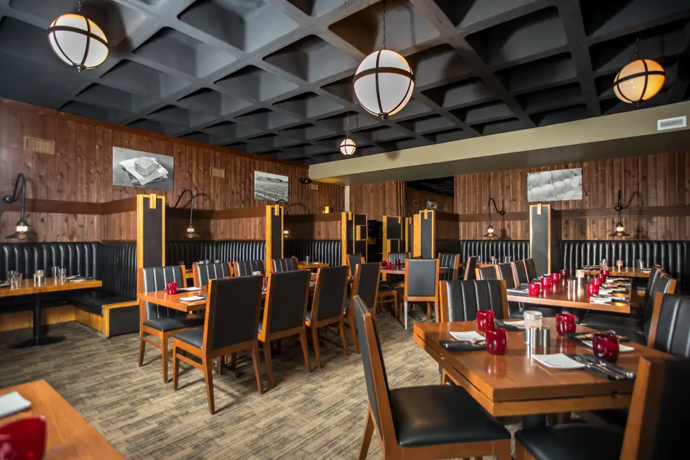 Tables and chairs at the Steak Pit