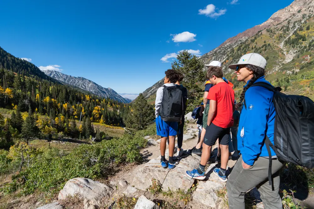 Play Forever tour at Snowbird with students looking at Little Cottonwood Canyon
