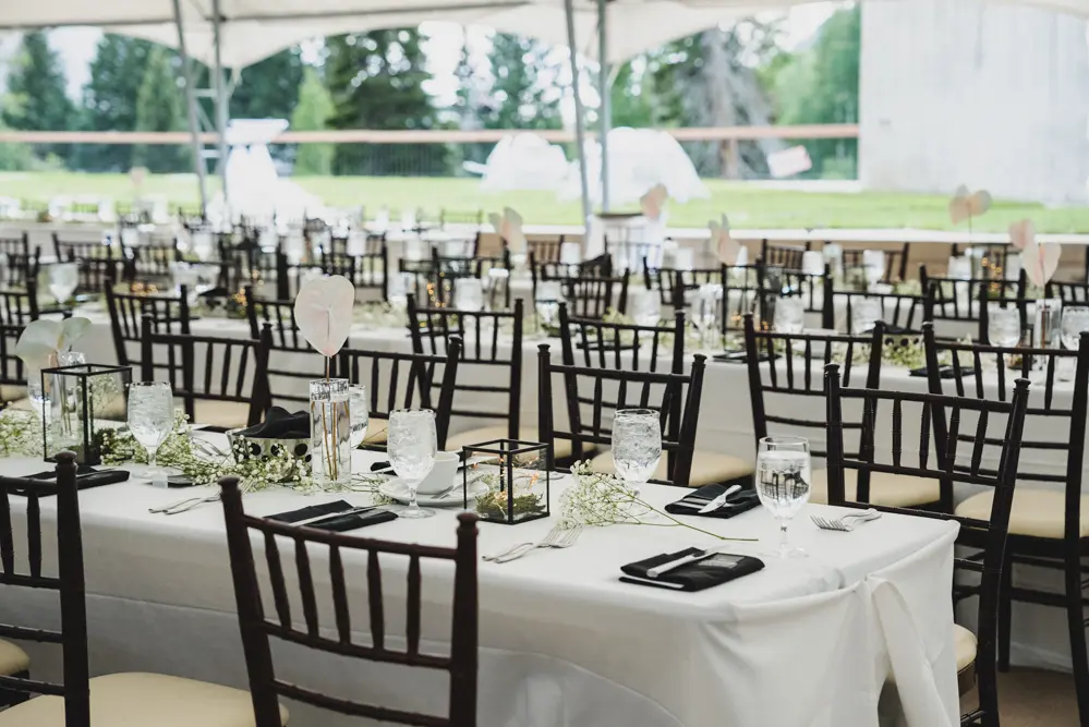 Tables set in the Terrace Tent wedding venue at Snowbird