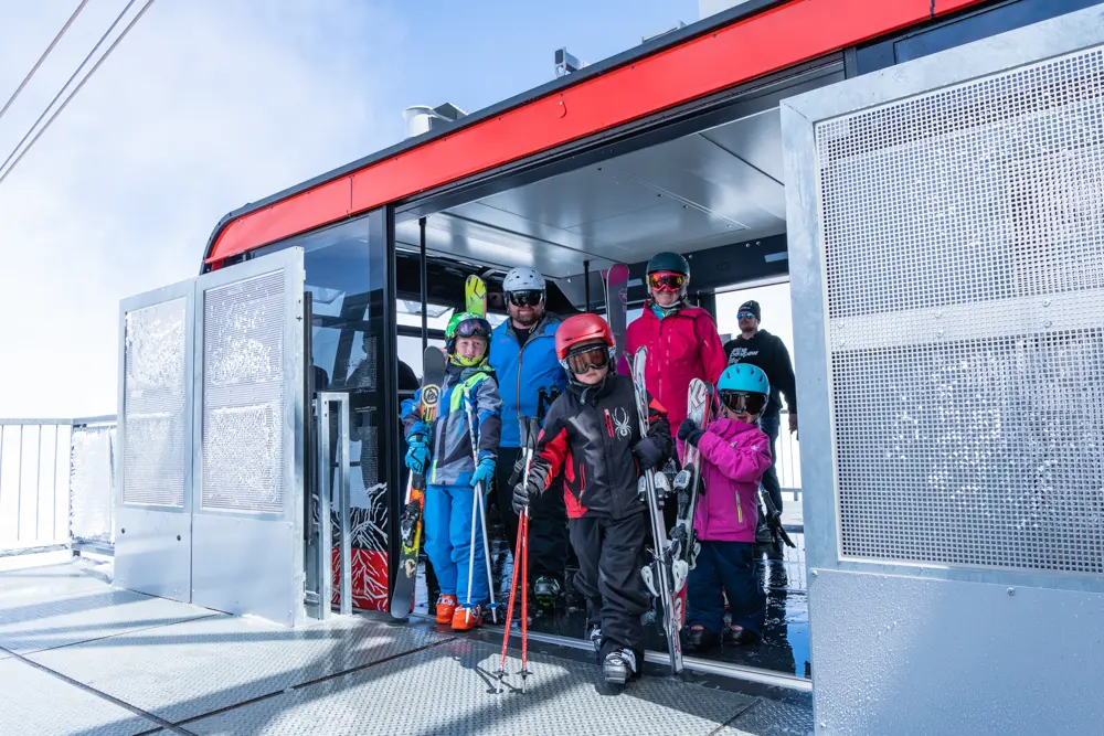 Family walks of the Snowbird Tram at the Summit during a family reunion