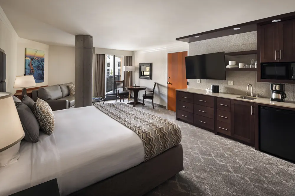 Crest 1-Bedroom option at Snowbird's Cliff Club- featuring a bed and wet bar