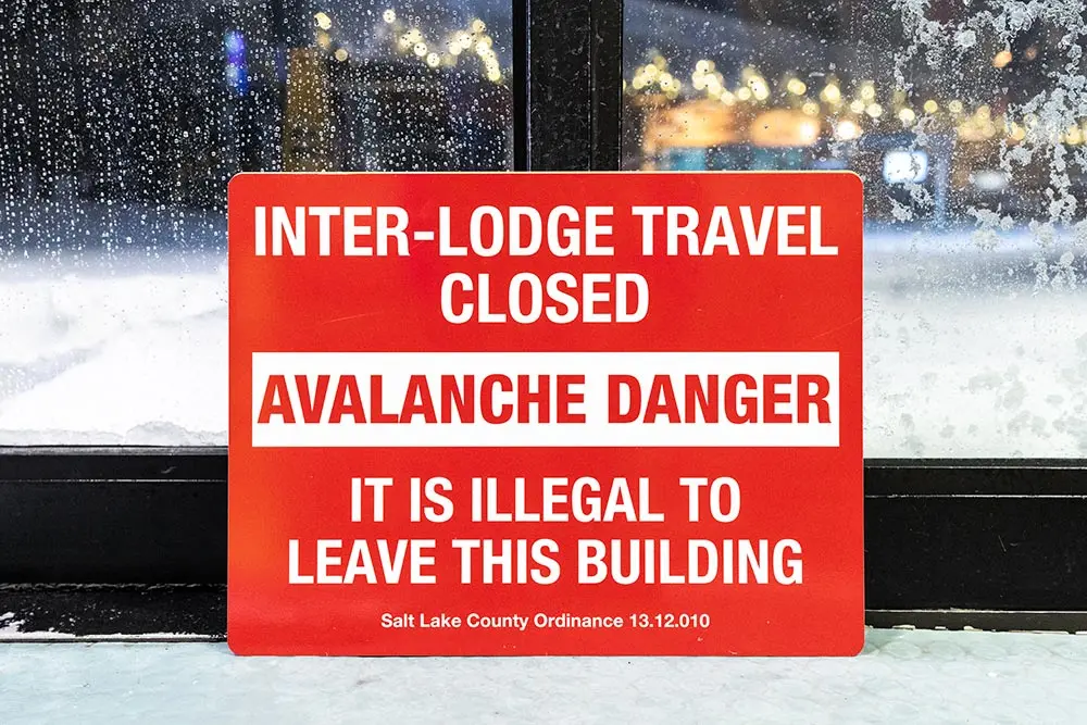 Snowbird Interlodge sign stating "It is illegal to leave this building"