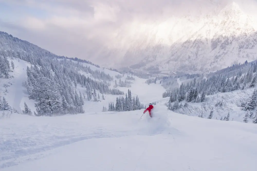 Skiing powder at sunrise with Snowbird's membership program, Basecamp