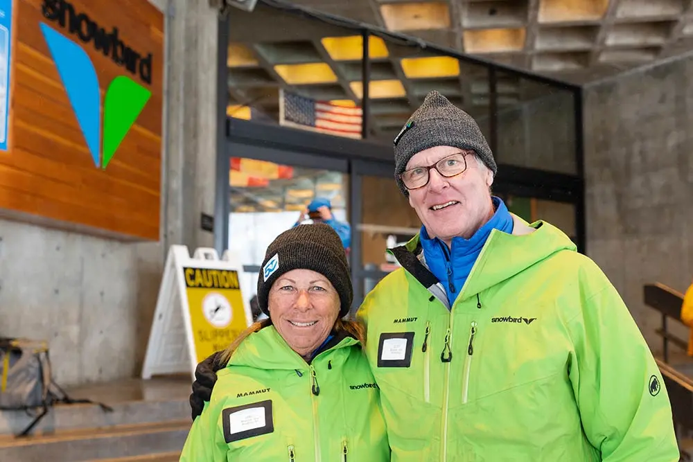 Mountain Orientation Tour guides pose out front of the Snowbird Center