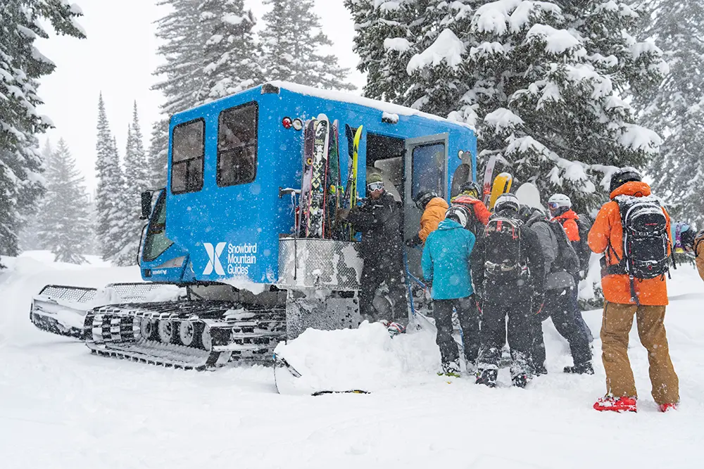 Snowcat Skiing at Snowbird - Group loads into the snowcat at the bottom of a run