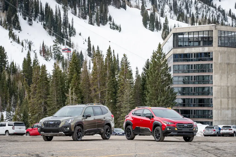 2 subarus parked close to The Cliff Lodge at Snowbird