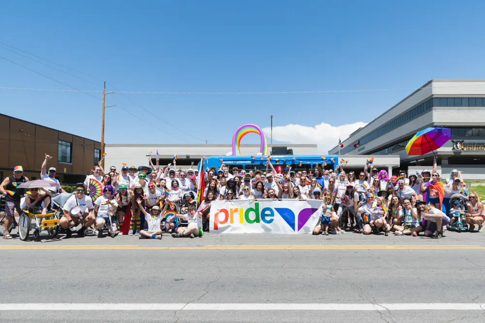 Snowbird Employees pose for a photo after the Pride Parade