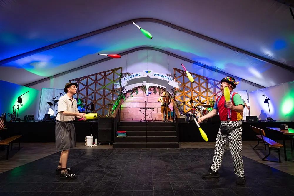 Jugglers on the Oktoberfest Grand Halle stage at Snowbird's Oktoberfest