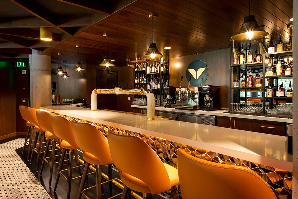 The SeventyOne bar at Snowbird with bright yellow bar stools