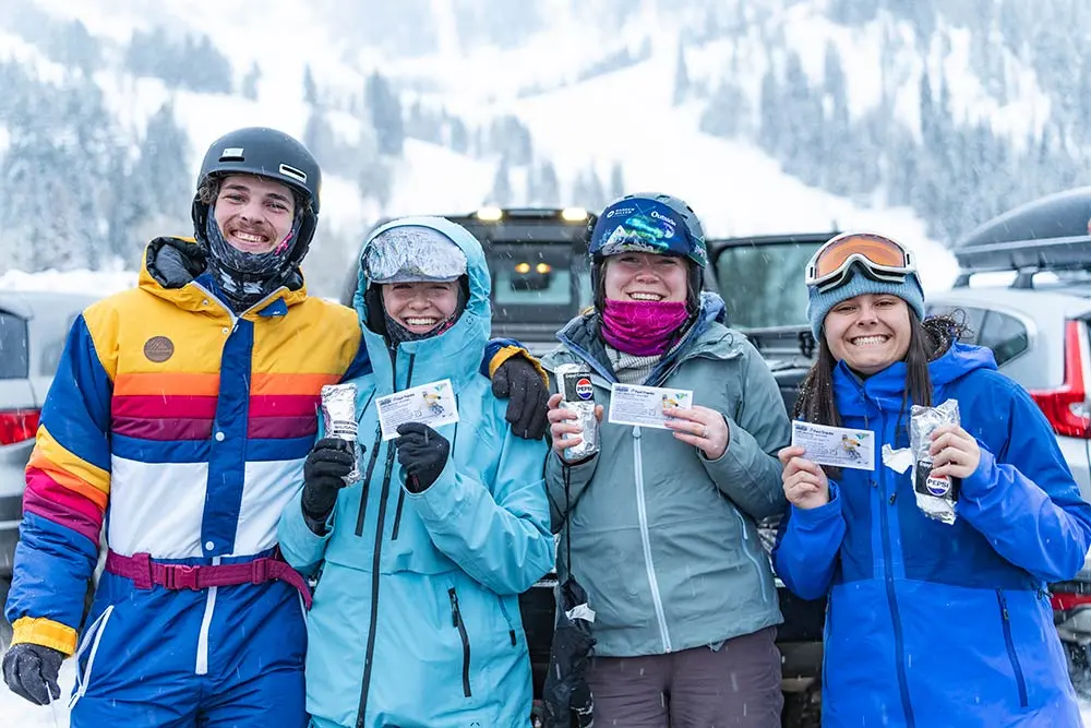 Carpoolers pose with rewards from the Canyon Carpool Club