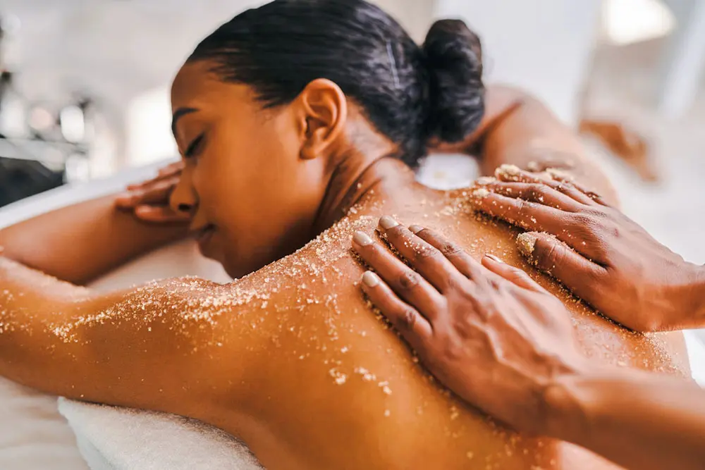 Woman enjoys a body scrub/Body wrap at Snowbird's Cliff Spa