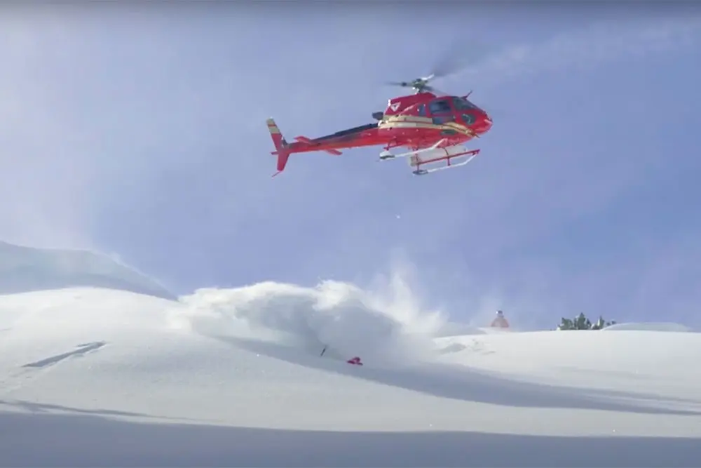 Skiing powder under helicopter, video cover