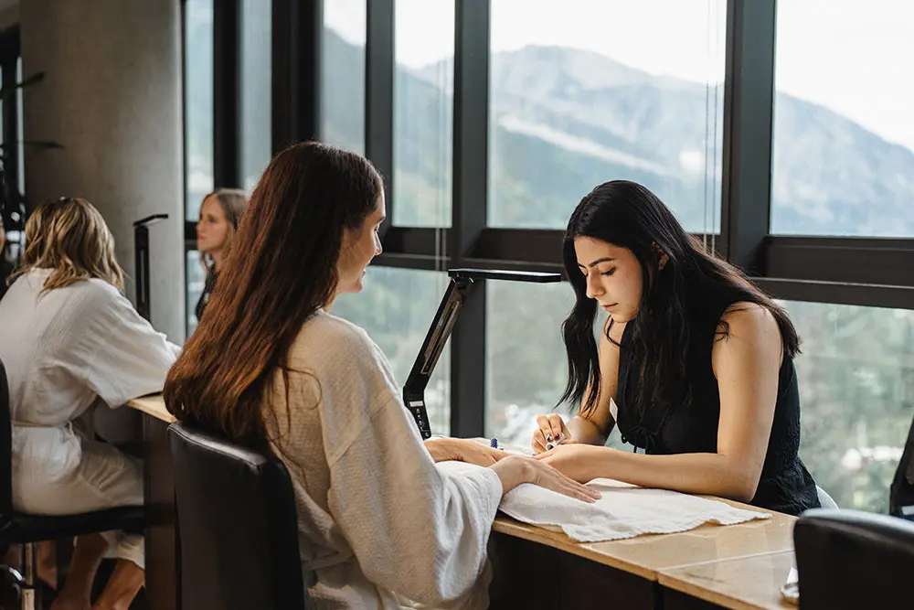 Woman receives a manicure at the Cliff Spa at Snowbird