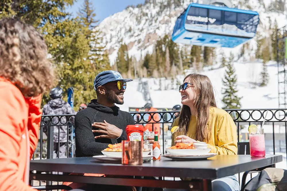 People talk and enjoy apres at the Forklift at Snowbird