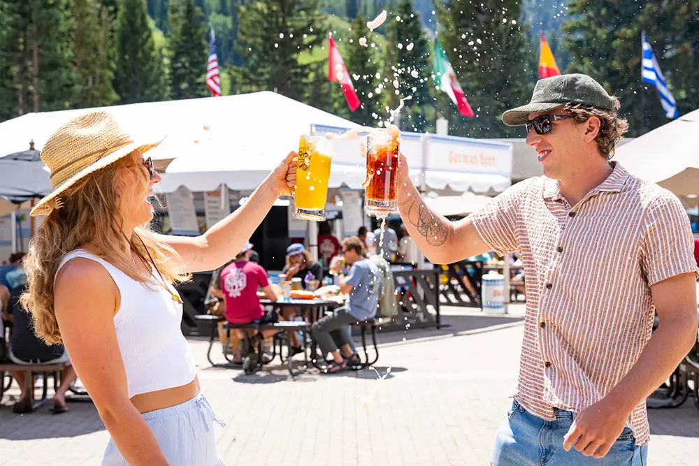 a couple cheers beers at Snowbird's Oktoberfest