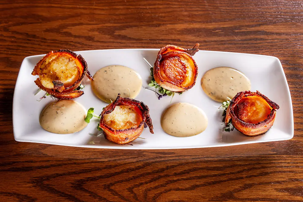 The famous bacon-wrapped scallops from Snowbird's Steak Pit restaurant