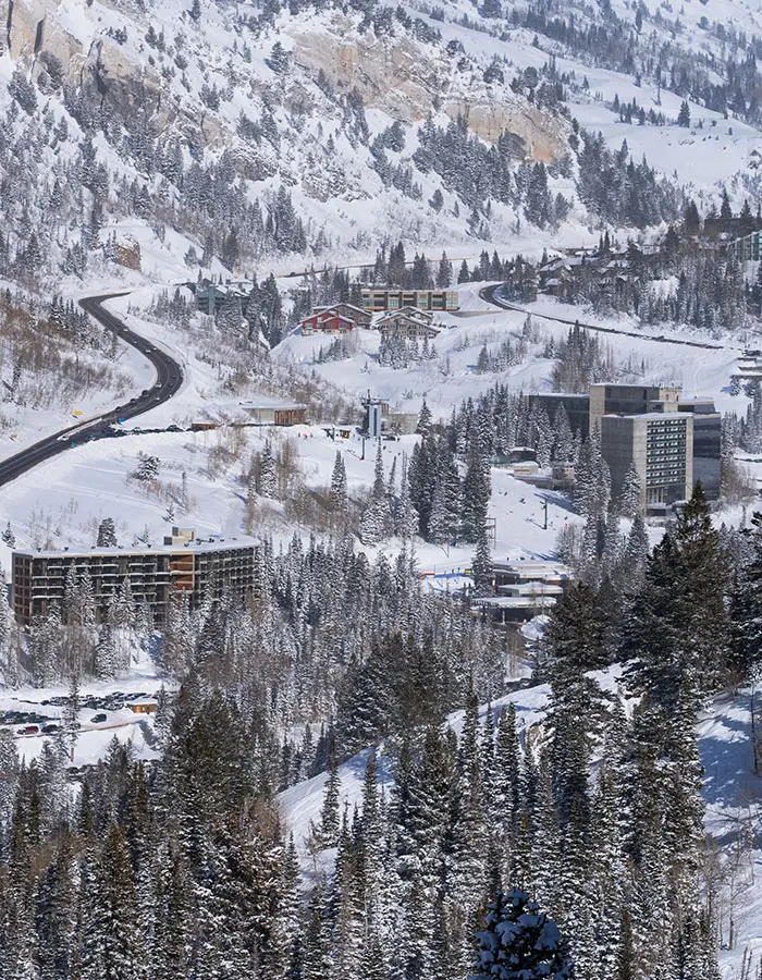 Mobile hero of the lodges at Snowbird next to the lifts