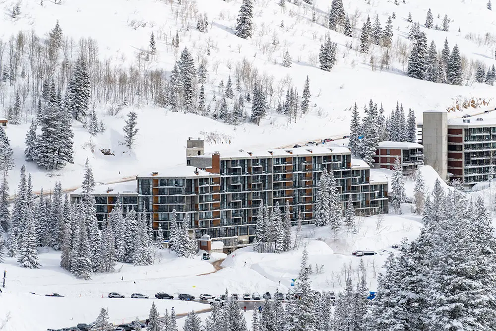 The exterior of the Iron Blosam hotel at Snowbird during the winter. The Iron Blosam is a slopeside lodging property where you can walk to lifts
