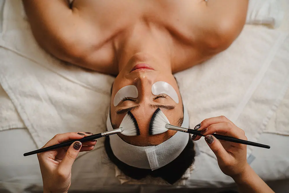Someone at The Cliff Spa receives the All is Bright facial, a spa special during winter