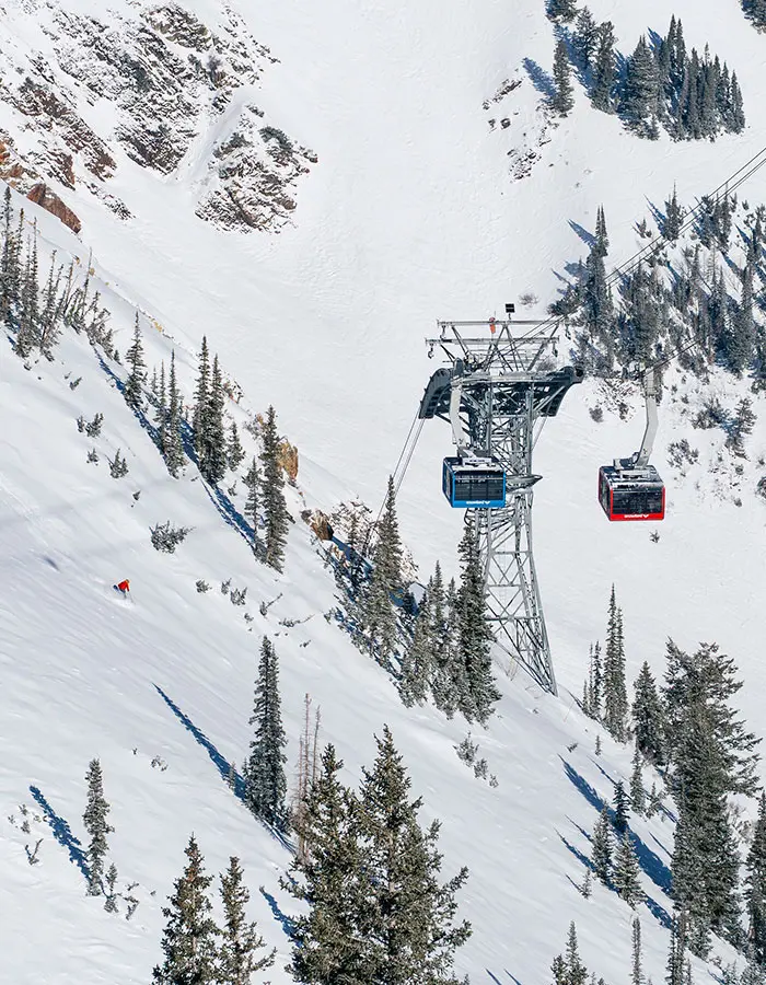 Mobile hero of skier under the trams during the February scan challenge