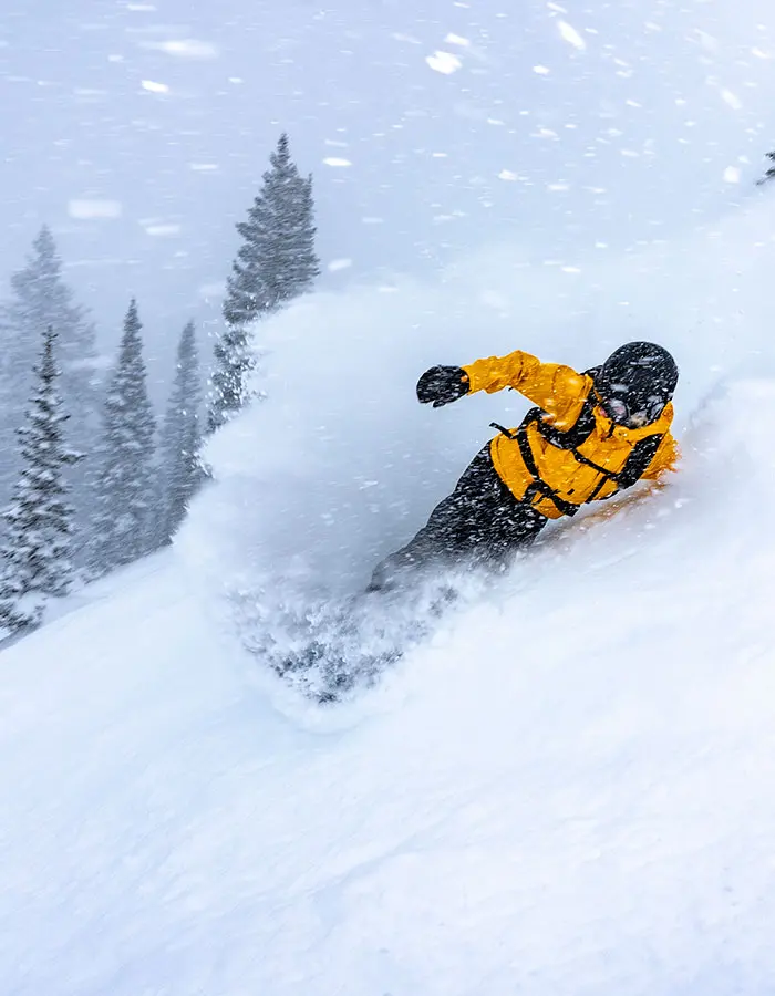 Snowboarder in deep snow mobile hero, february storm snowbird