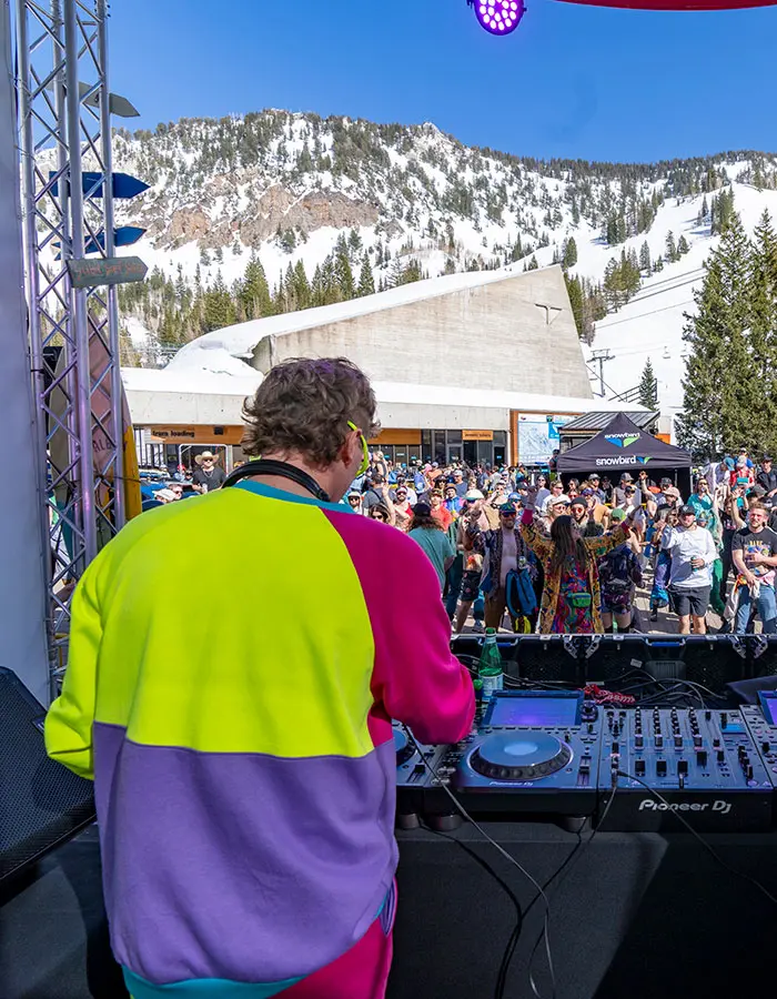 DJ plays at Plazapalooza at Snowbird's annual spring concert series- mobile hero
