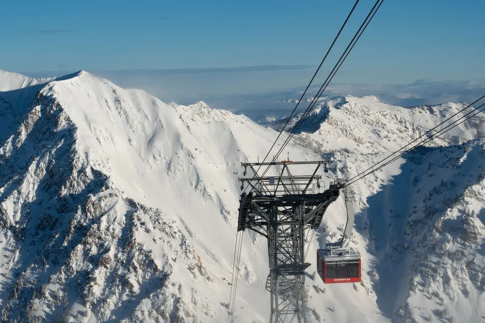 Tram rises up with Superior in the background after a March Storm day