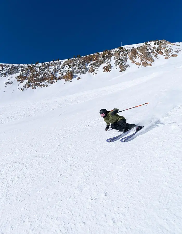 mobile her of a girl skiing groomers at snowbird