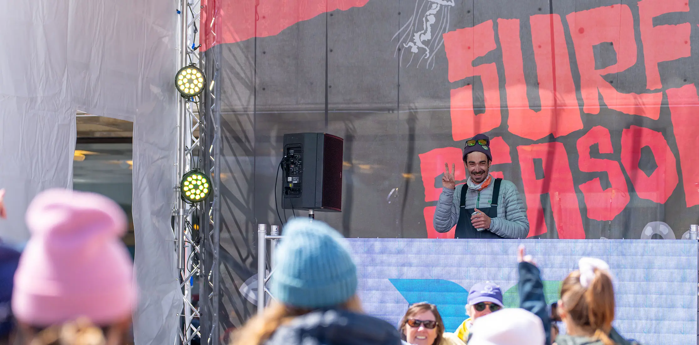 Dj poses and smiles at Plazapalooza Electronic Music Weekend