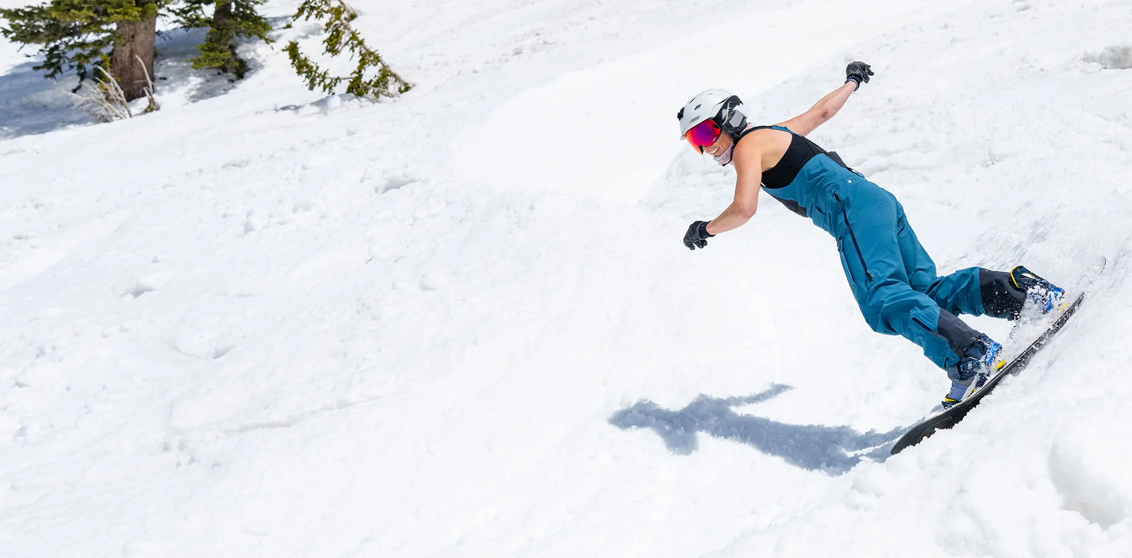 Snowboarder rides the wiggle in Spring at Snowbird