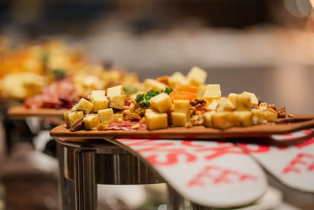 Snowbird cheese board on skis during a group event.