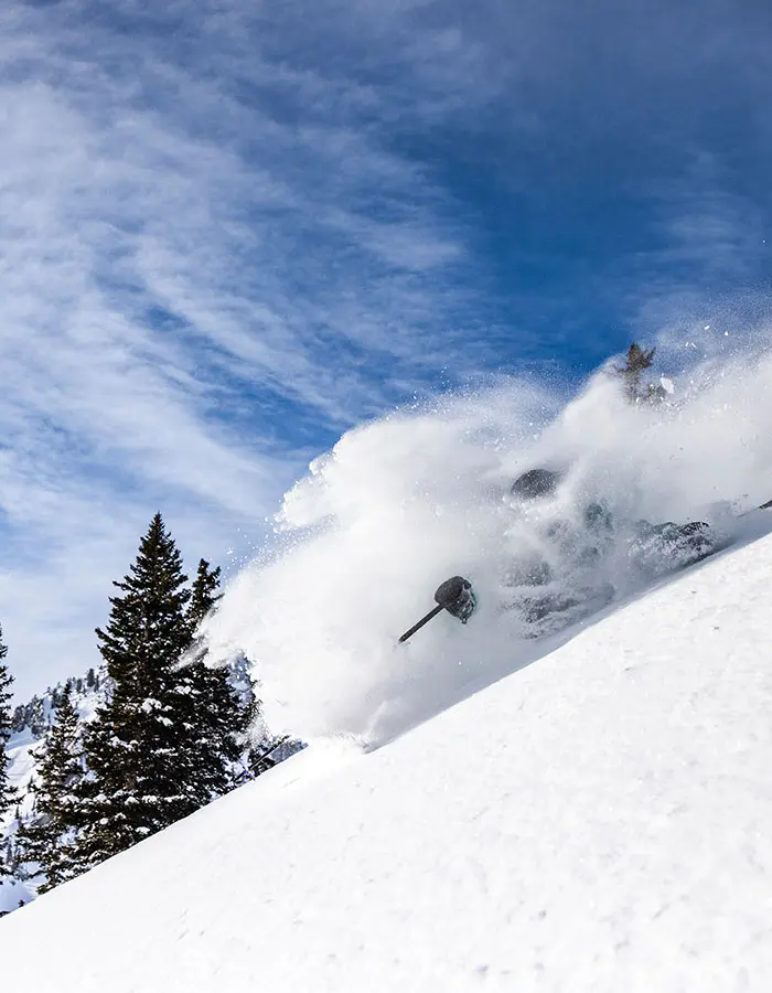mobile hero of a skier in deep overhead powder at snowbird