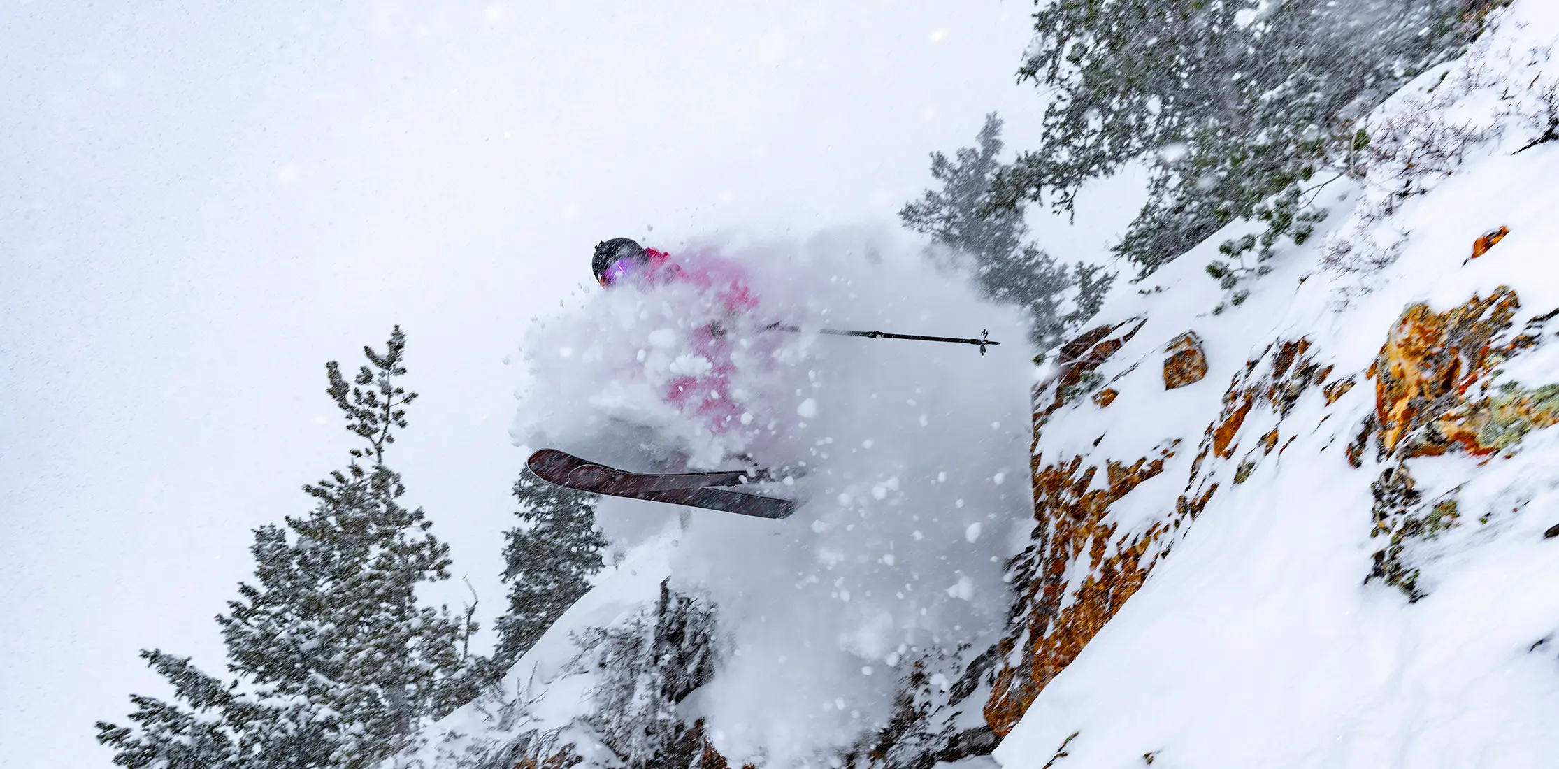Skier with Snowbird Pass jumps off a cliff, promotion for 1 day to save on Snowbird Pass