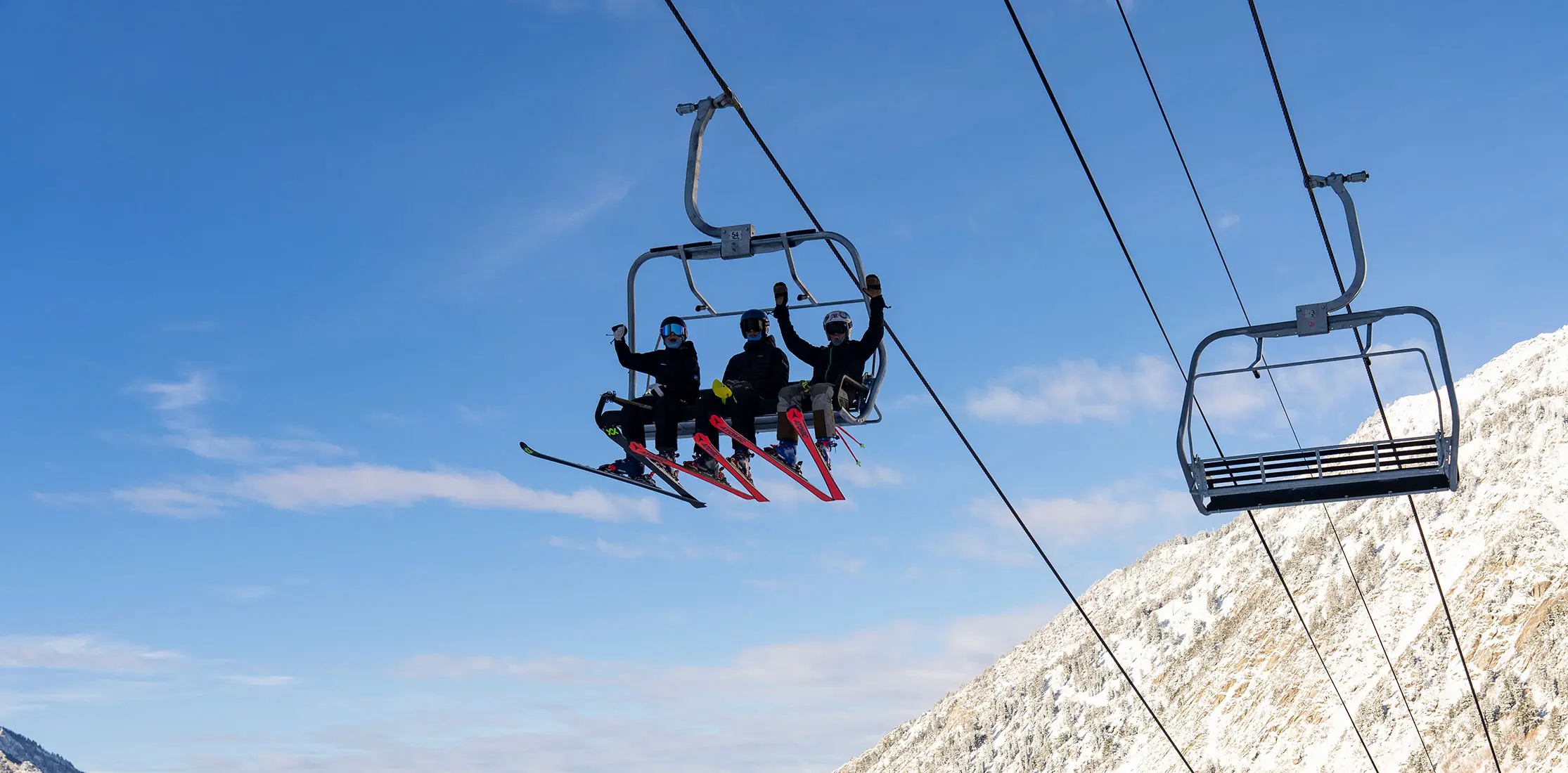 Group cheering on the lift on opening day