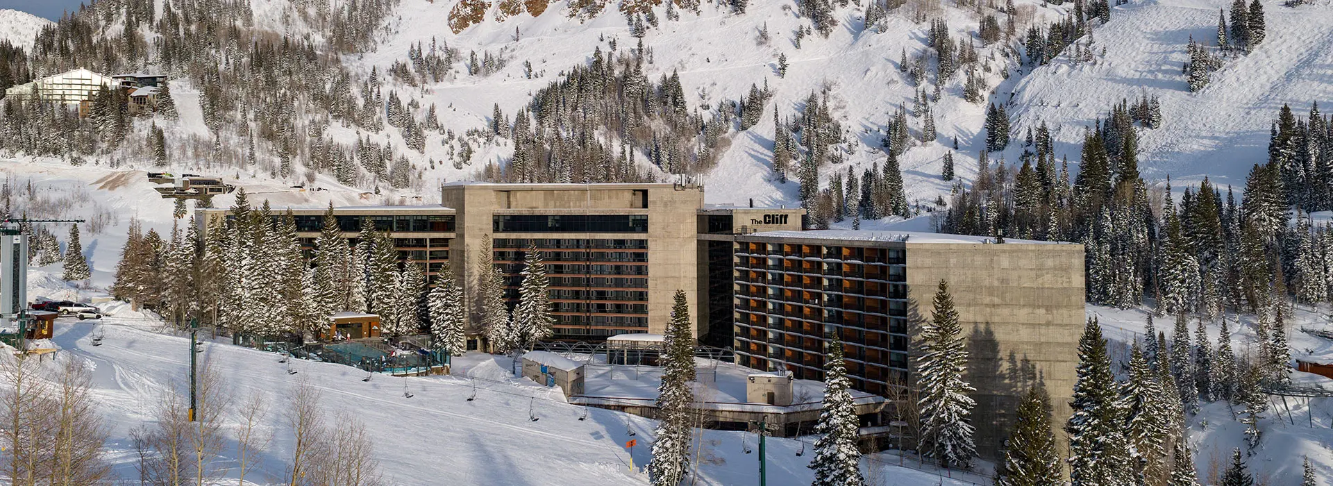The Cliff Lodge at Snowbird during winter- one of Snowbird's lodging properties close to the mountain