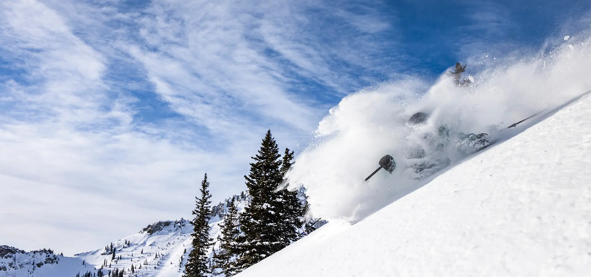 Snowbird Mountain Report hero - person skis in Mineral Basin at Snowbird