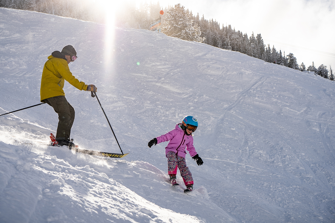 Kids Freeloader Pass at Snowbird- Kid and Dad skiing