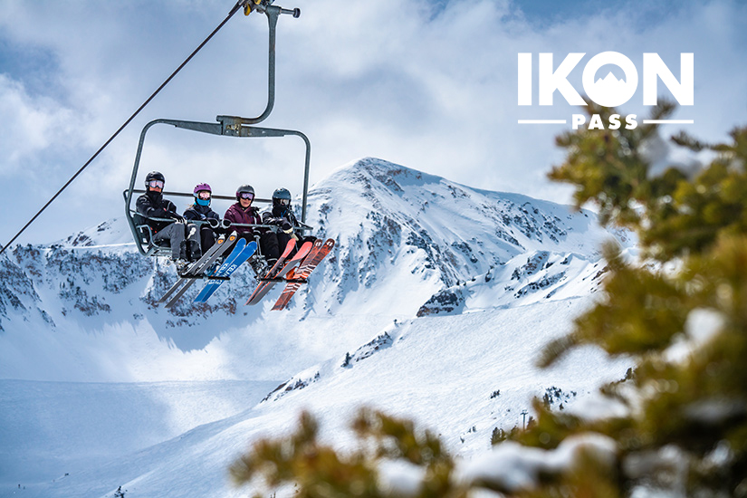 skiers on a chairlift at Snowbird with the Ikon Pass